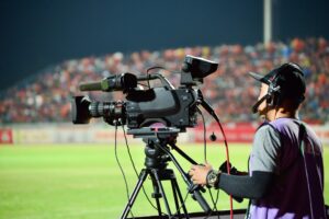 Cameraman during a football game